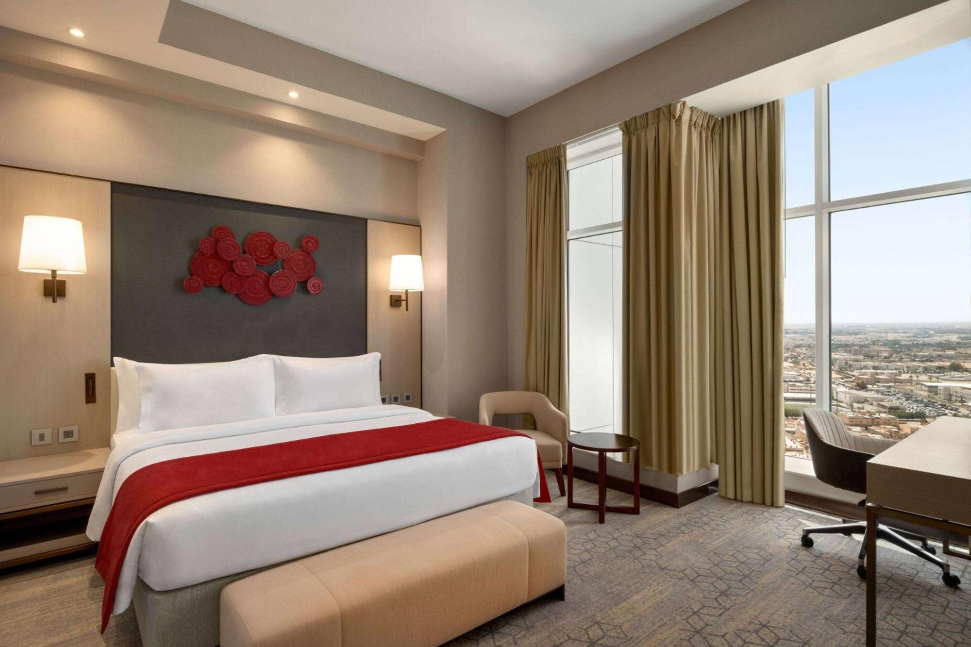 ホテル Ramada By Wyndham Riyadh King Fahd Road エクステリア 写真 A bedroom at the hotel